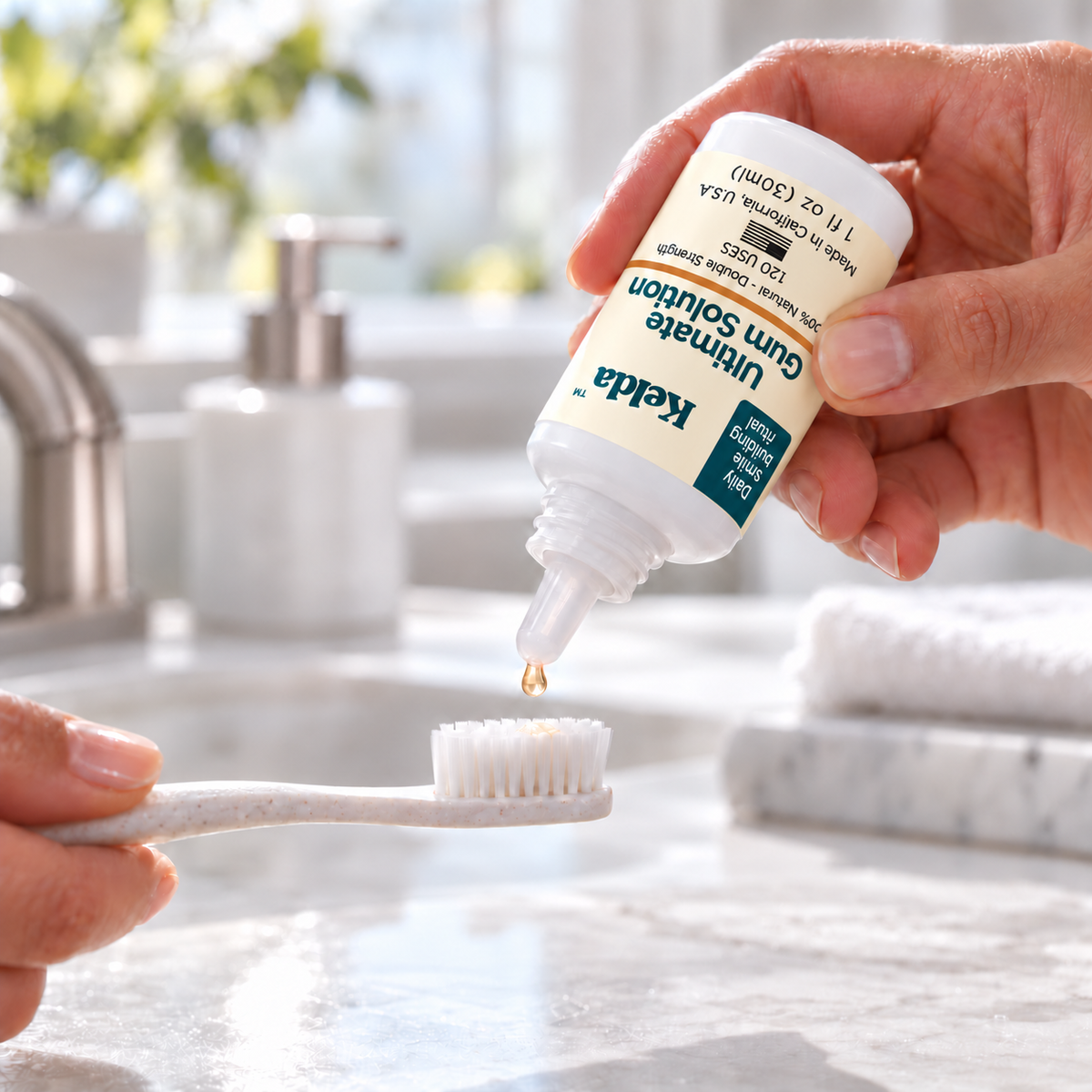 Light amber drops of Ultimate Gum Solution falling onto a soft toothbrush